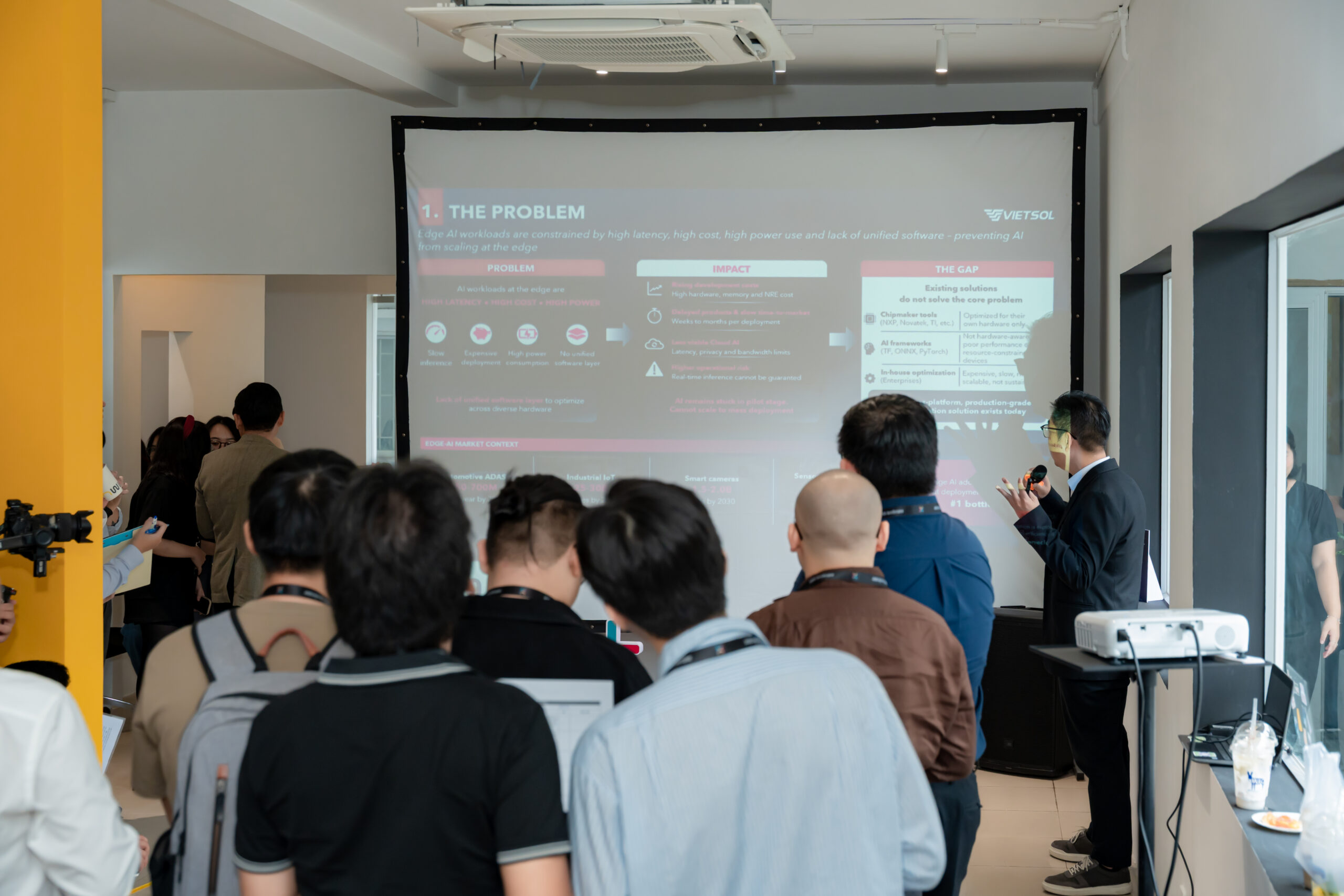 Mr. Le Quang Son presenting Vietsol Edge AI Optimization during the Pizza Pitching session at Ecosystem Meetup.